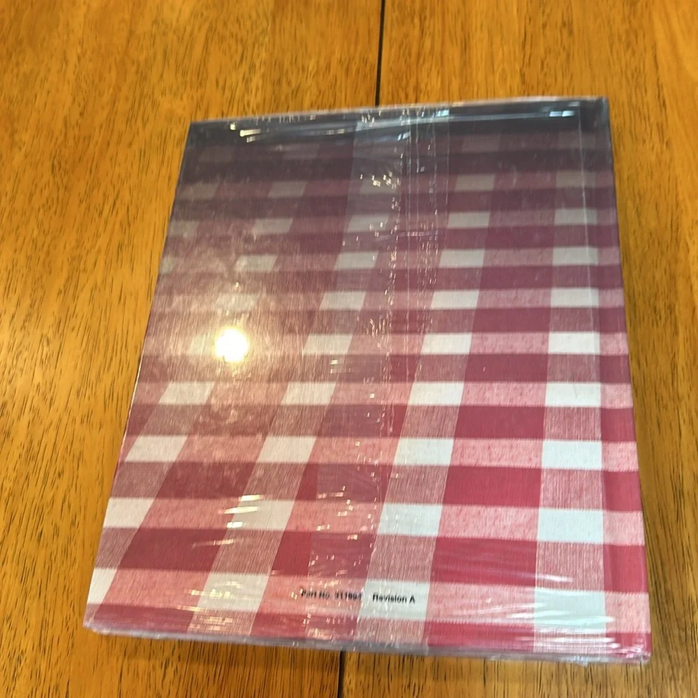 2- Microwave cookbooks. One is still in plastic by Whirlpool. The other Litton
